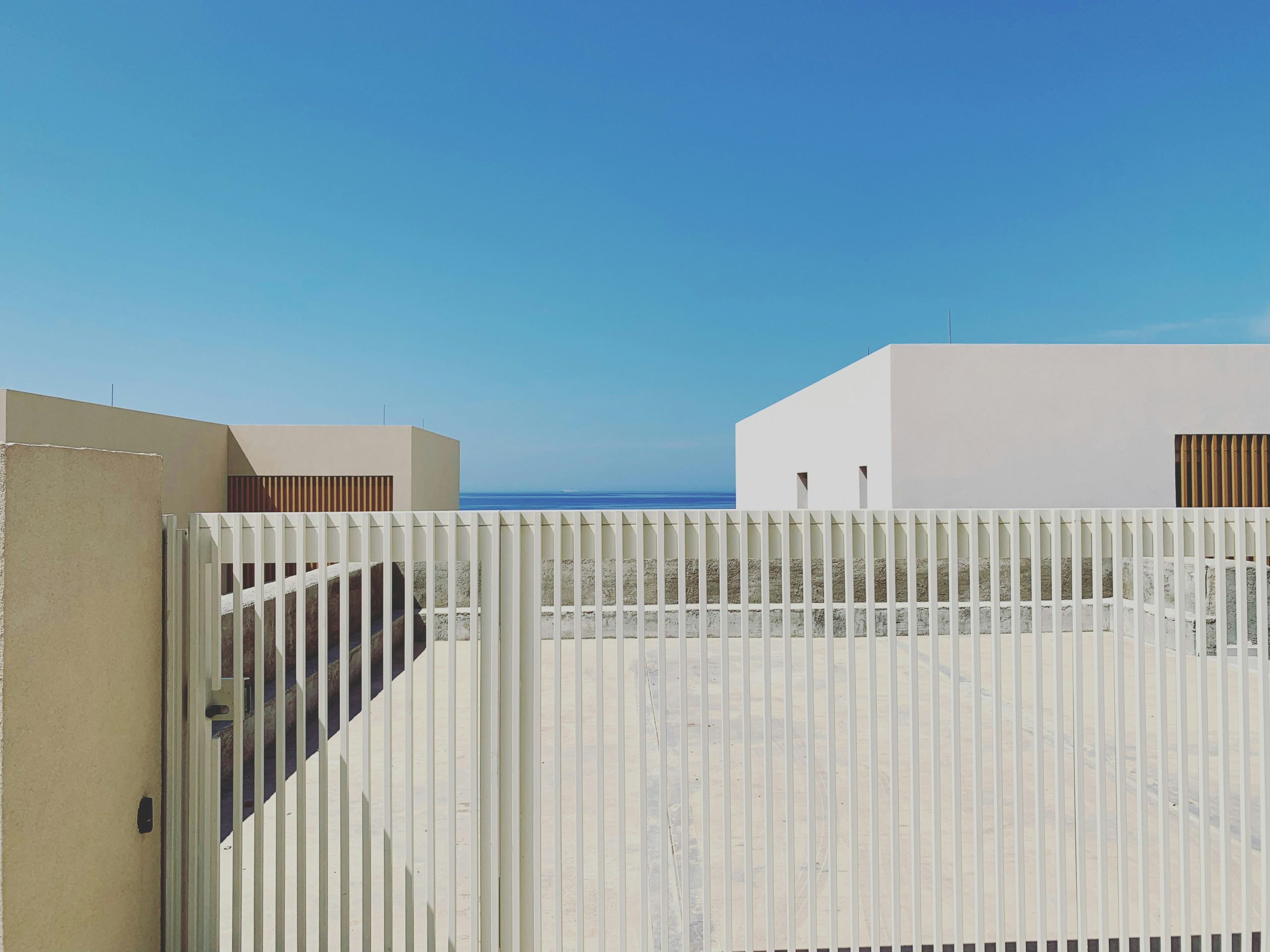 close-up of a white electric gate